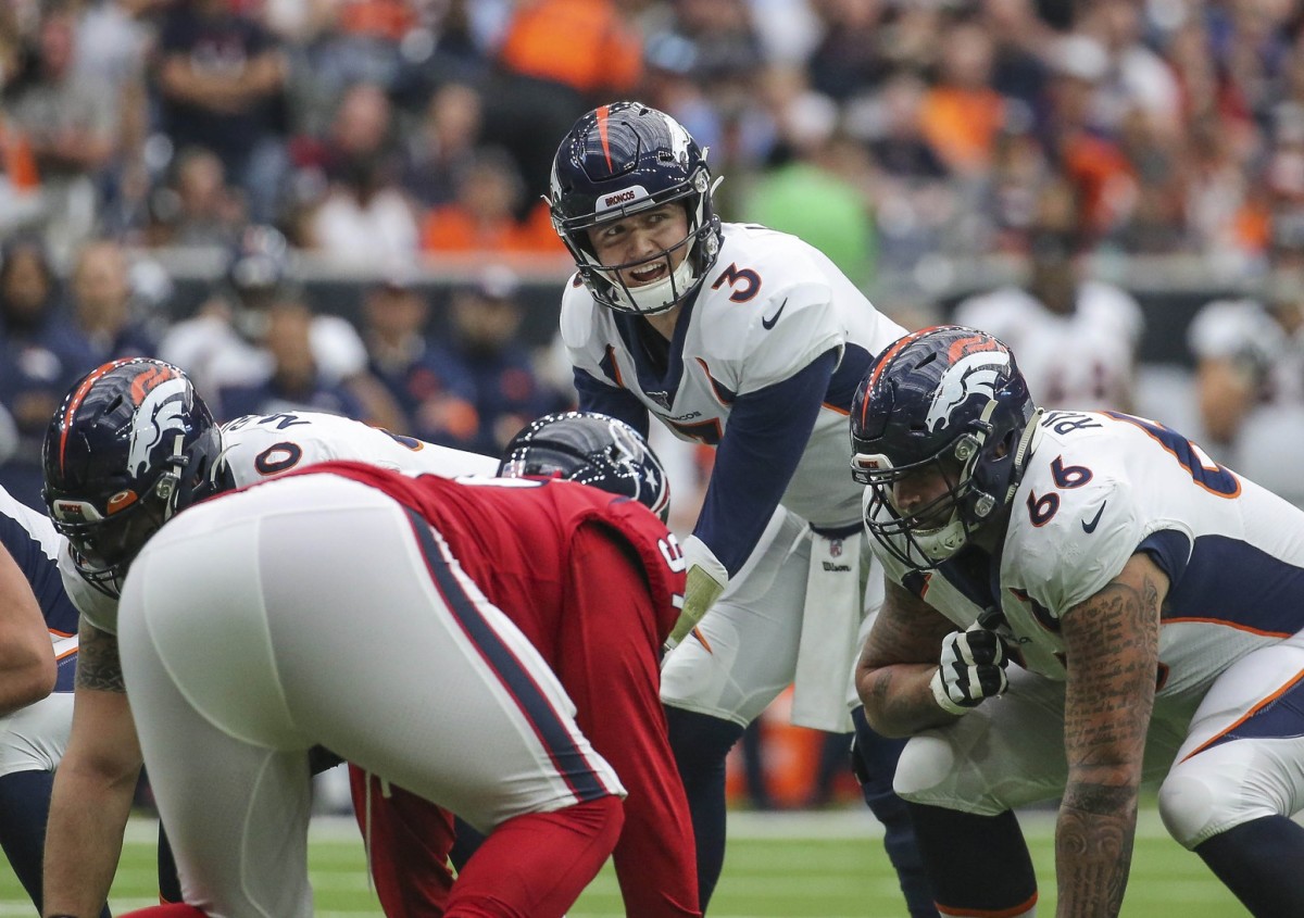 Denver Broncos quarterback Drew Lock (3) at the line of scrimmage during the first quarter against the Houston Texans at NRG Stadium.