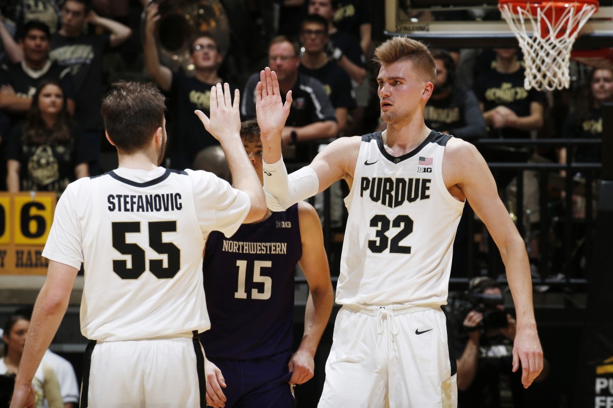 Purdue guard Sasha Stefanovic (left) gives Matt Haarms a high-five during the Boilermakers' 58-44 win over Northwestern. (Mandatory credit: USA TODAY)