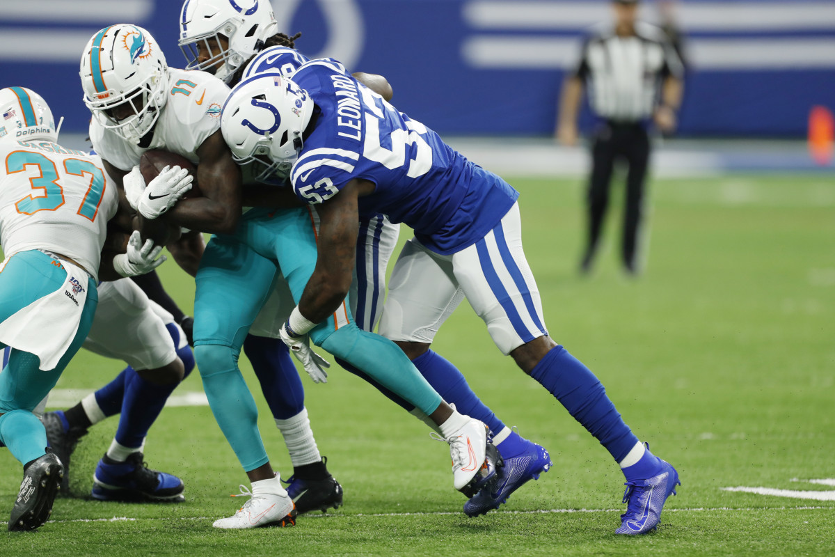 Nov 10, 2019; Indianapolis, IN, USA; Indianapolis Colts linebacker Darius Leonard (53) tackles Miami Dolphins wide receiver DeVante Parker (11) during the first quarter at Lucas Oil Stadium. Mandatory Credit: Brian Spurlock-USA TODAY Sports