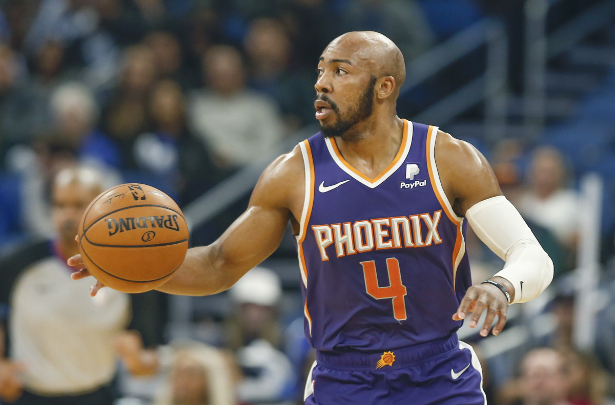 Phoenix Suns guard Jevon Carter (4) brings the ball down court during the second half against the Orlando Magic at Amway Center.