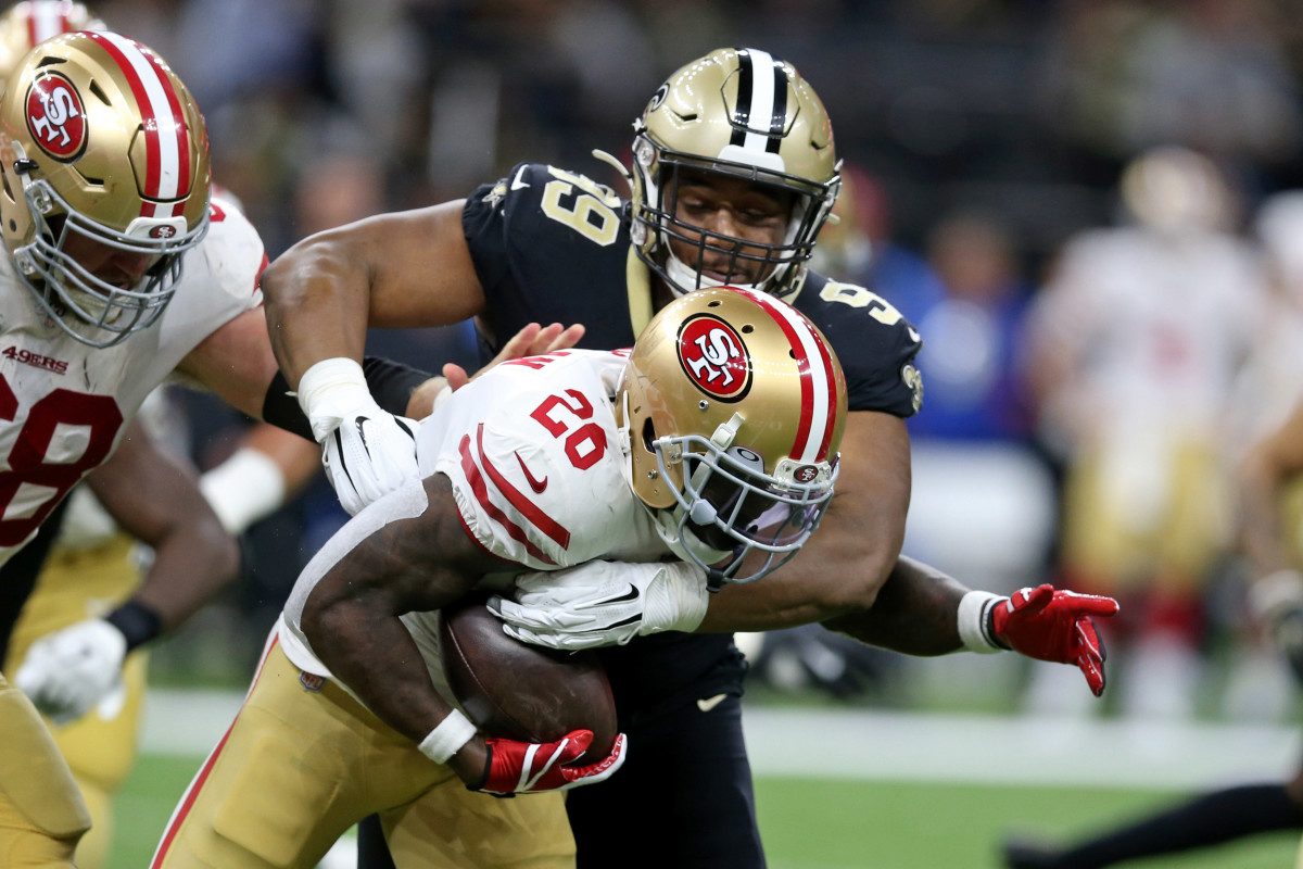 Dec 8, 2019; New Orleans, LA, USA; San Francisco 49ers running back Tevin Coleman (26) is tackled by New Orleans Saints defensive tackle Shy Tuttle (99) in the second half at the Mercedes-Benz Superdome. The 49ers won, 48-46. Mandatory Credit: Chuck Cook-USA TODAY Sports