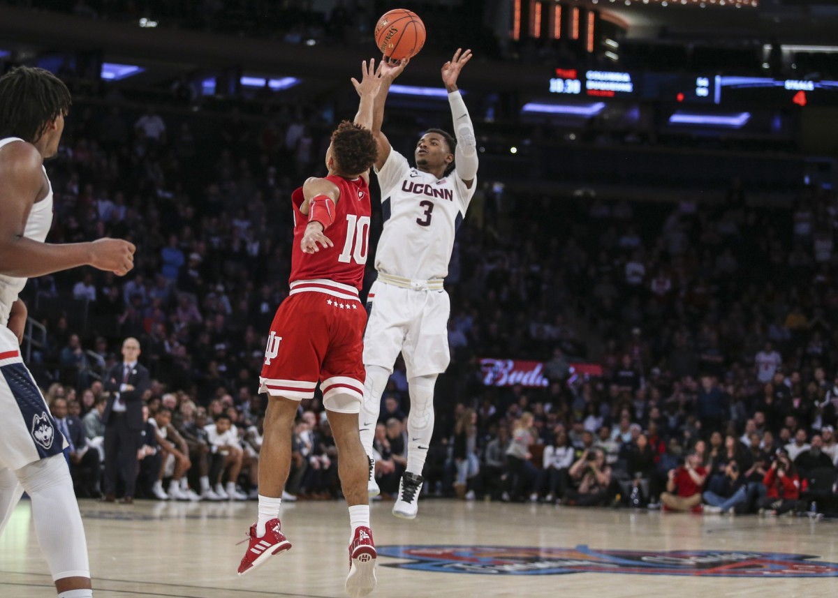 Connecticut Huskies Alterique Gilbert (3) is contested on a jump shot by Indiana's Rob Phinisee (10)  in the first half against the Indiana Hoosiers at Madison Square Garden. (Mandatory Credit: Wendell Cruz-USA TODAY Sports)