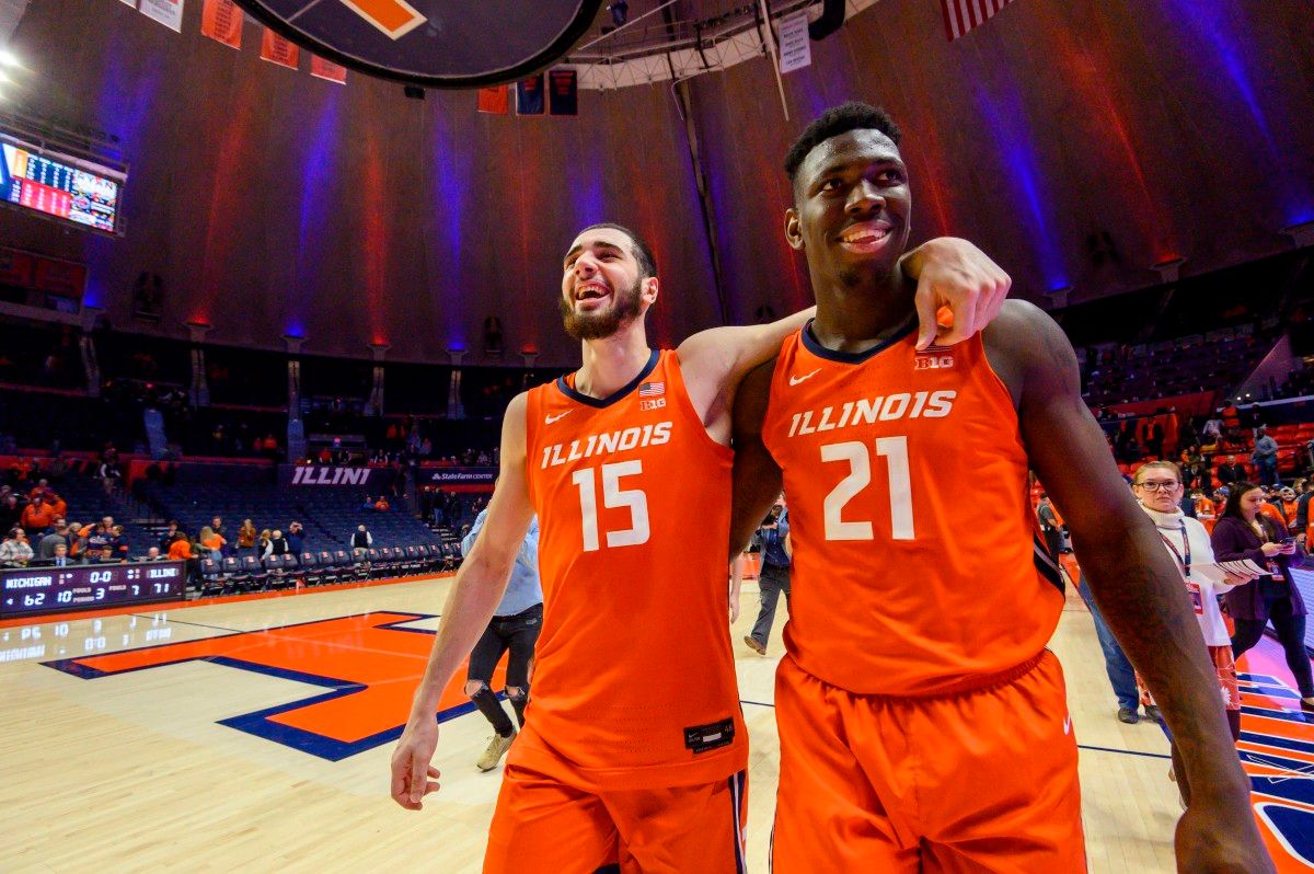 Illinois Fighting Illini forward Giorgi Bezhanishvili (15) and center Kofi Cockburn (21) celebrate after the second half against the Michigan Wolverines at State Farm Center.