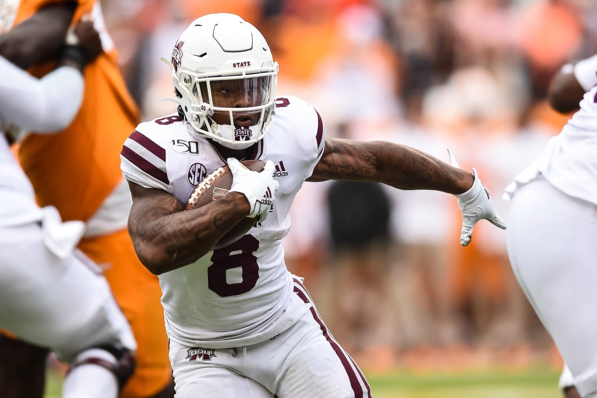 Mississippi State Bulldogs running back Kylin Hill (8) runs the ball during the second half of a game against the Tennessee Volunteers at Neyland Stadium.