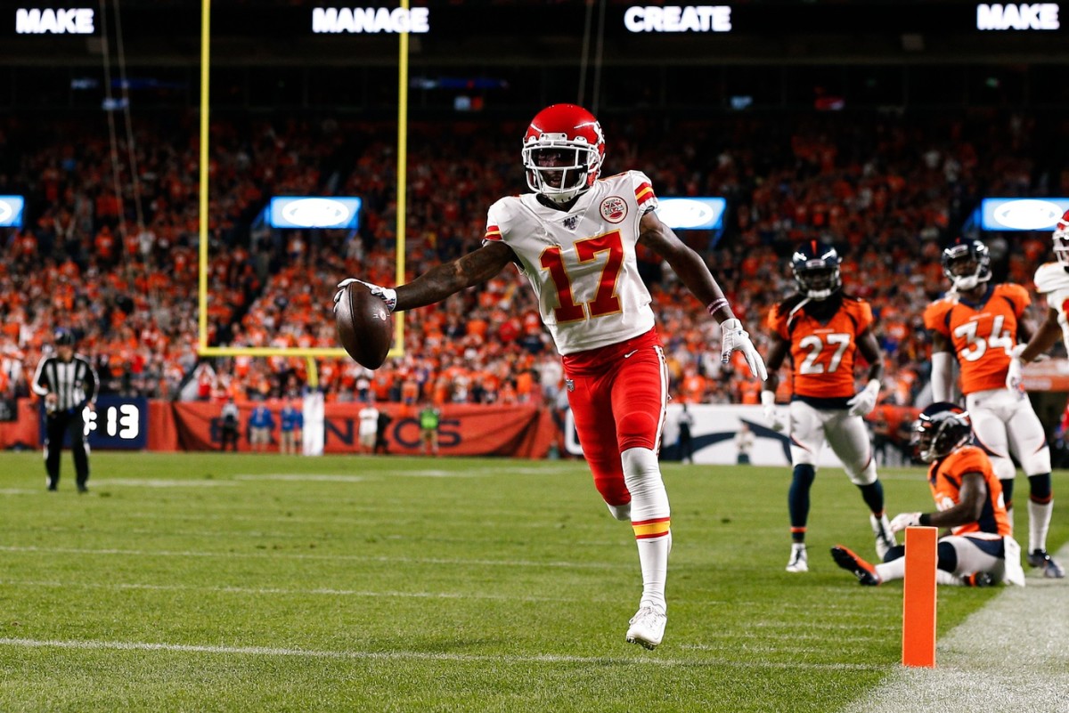 Kansas City Chiefs wide receiver Mecole Hardman (17) scores a touchdown in the first quarter against the Denver Broncos at Empower Field at Mile High.