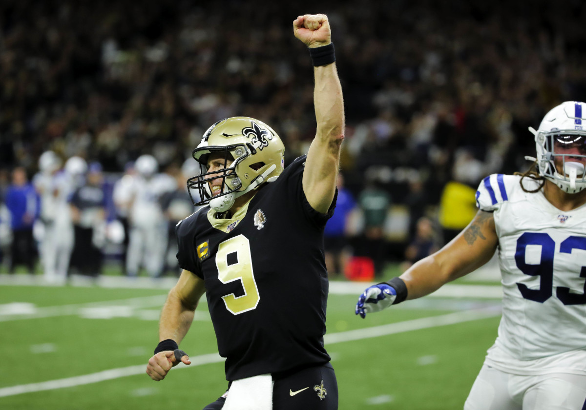 New Orleans Saints quarterback Drew Brees raises his fist after throwing a touchdown pass negated by penalty in the second quarter of Monday's 34-7 home win over the Indianapolis Colts at the Mercedes-Benz Superdome.