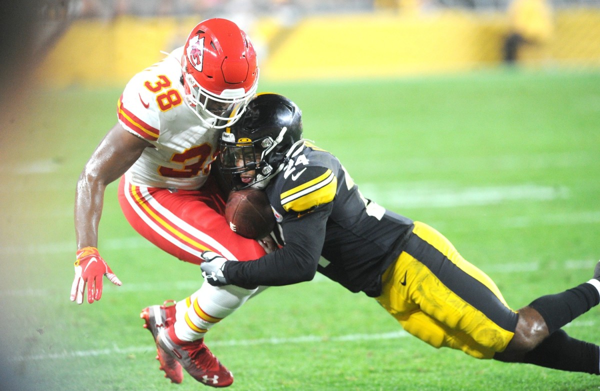 Pittsburgh Steelers safety P.J. Locke (24) breaks up a pass intended for Kansas City Chiefs running back Marcus Marshall (38) during the fourth quarter at Heinz Field.