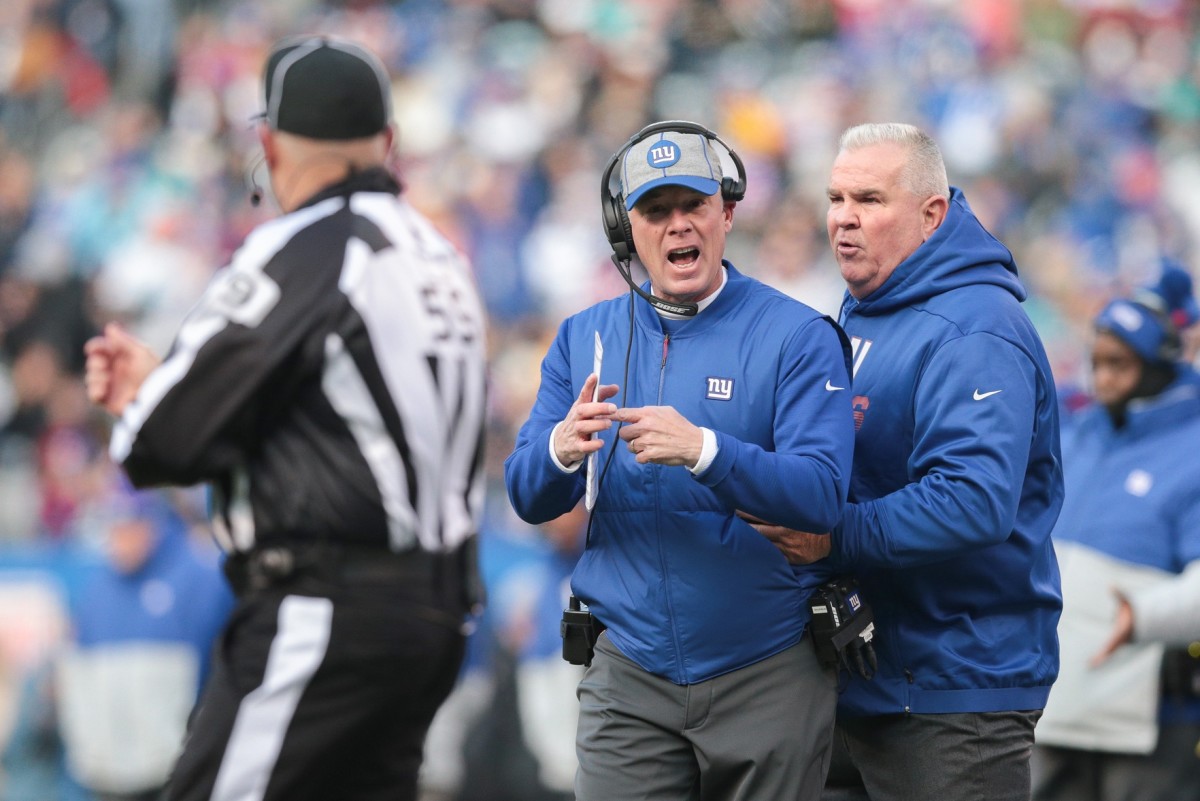 Dec 15, 2019; East Rutherford, NJ, USA; New York Giants head coach Pat Shurmur signals for time out to side judge Alex Kemp (55) during the first half against the Miami Dolphins at MetLife Stadium.