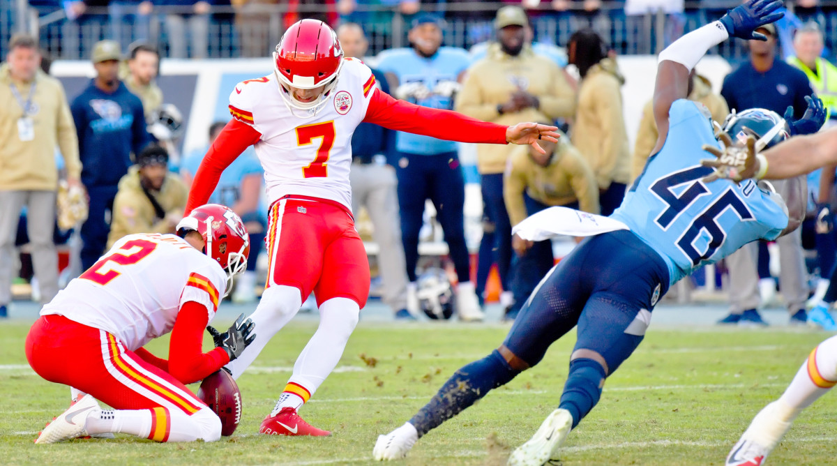 Nov 10, 2019; Nashville, TN, USA; Tennessee Titans defensive back Joshua Kalu (46) blocks a field goal attempt by Kansas City Chiefs kicker Harrison Butker (7) to win the game 35-32 during the second half at Nissan Stadium. Mandatory Credit: Jim Brown-USA TODAY Sports