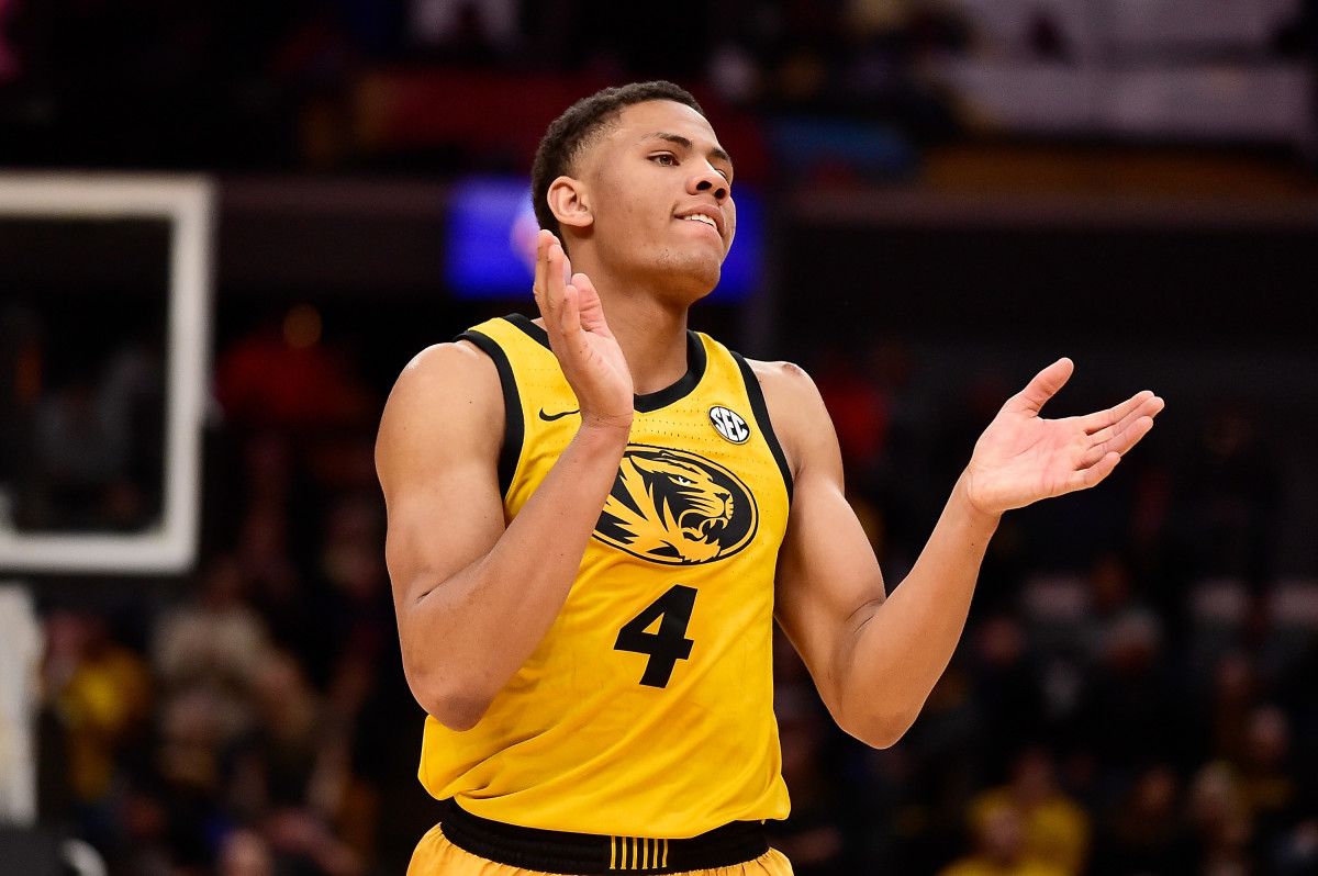 Missouri Tigers guard Javon Pickett (4) celebrates during the second half against the Illinois Fighting Illini at Enterprise Center.