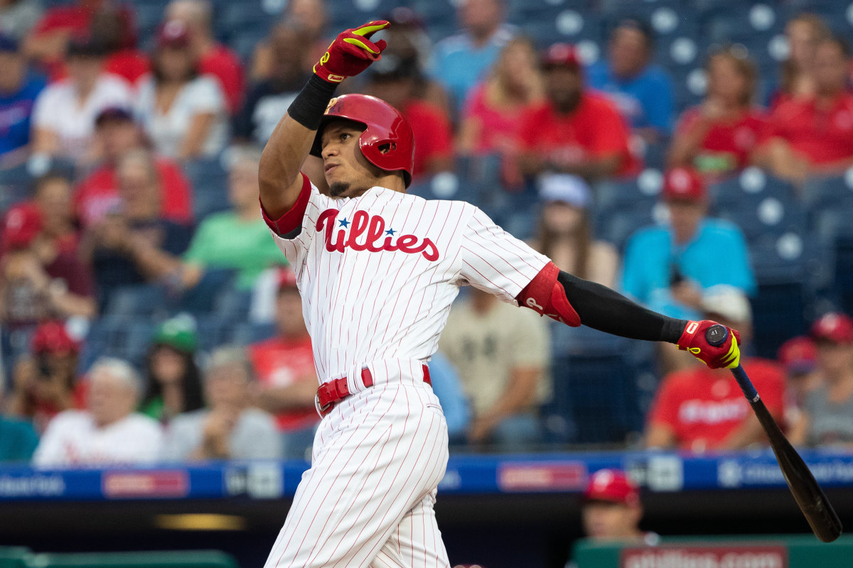 Sep 28, 2019; Philadelphia, PA, USA; Philadelphia Phillies second baseman Cesar Hernandez (16) hits a home run during the first inning against the Miami Marlins at Citizens Bank Park.