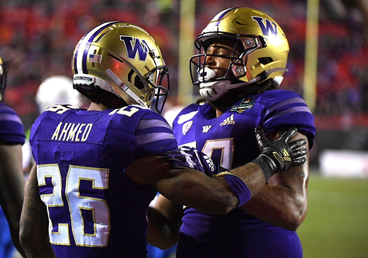 Chris Petersen, in signing off at the Las Vegas Bowl, said a patched-up UW line played well.