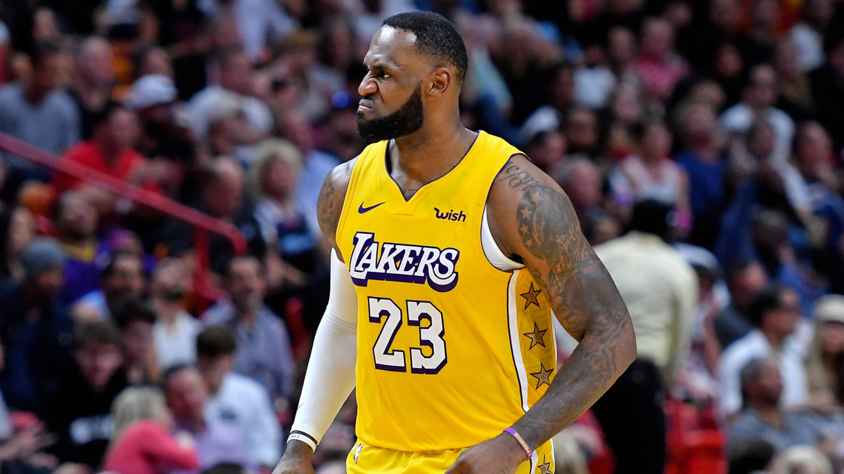 Los Angeles Lakers forward LeBron James reacts during the second half against the Miami Heat at American Airlines Arena.