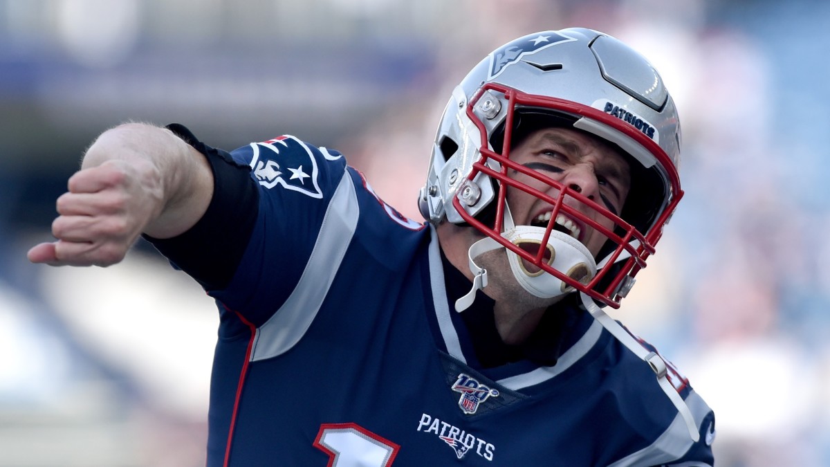 Tom Brady celebrates a touchdown pass gainst the Miami Dolphins at Gillette Stadium.