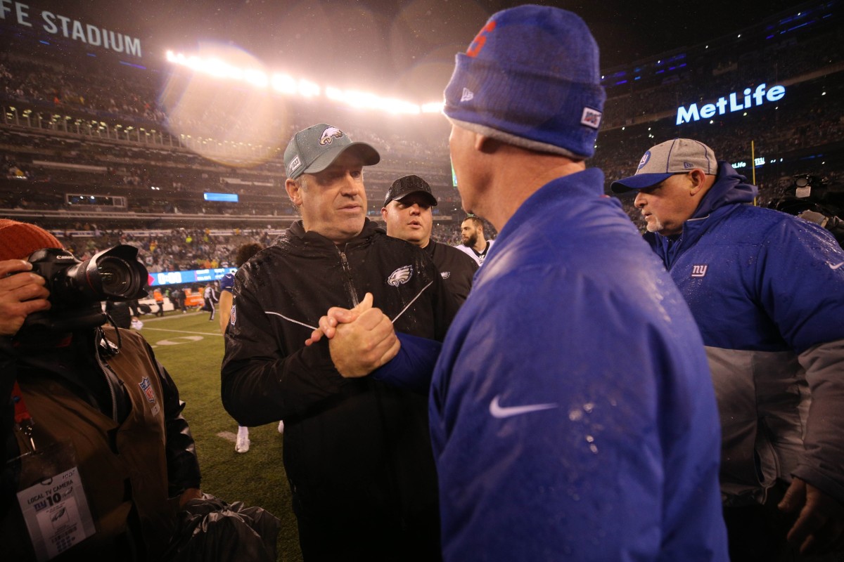 Dec 29, 2019; East Rutherford, New Jersey, USA; Philadelphia Eagles head coach Doug Pederson shakes hands with New York Giants head coach Pat Shurmur after a game at MetLife Stadium.