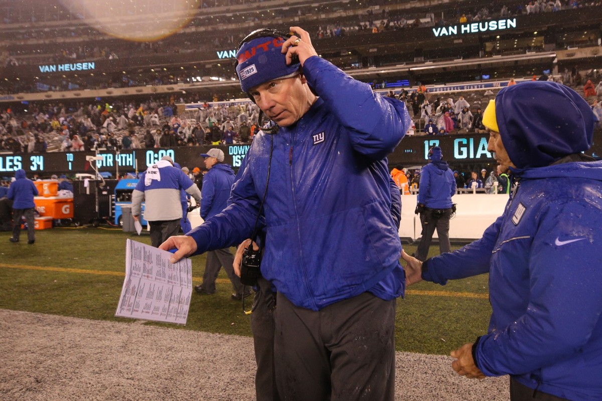 Dec 29, 2019; East Rutherford, New Jersey, USA; New York Giants head coach Pat Shurmur removes his headset after losing to the Philadelphia Eagles at MetLife Stadium.
