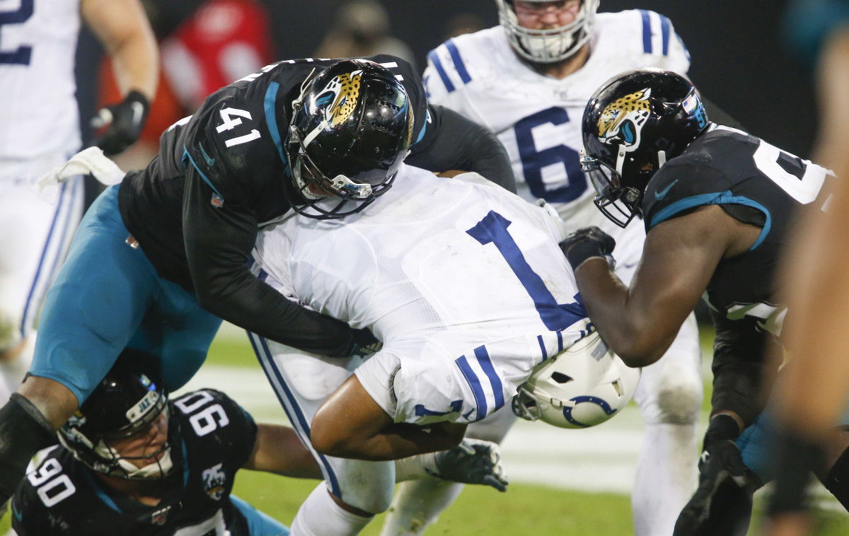 Indianapolis Colts quarterback Jacoby Brissett is sacked in Sunday's 38-20 loss at Jacksonville.