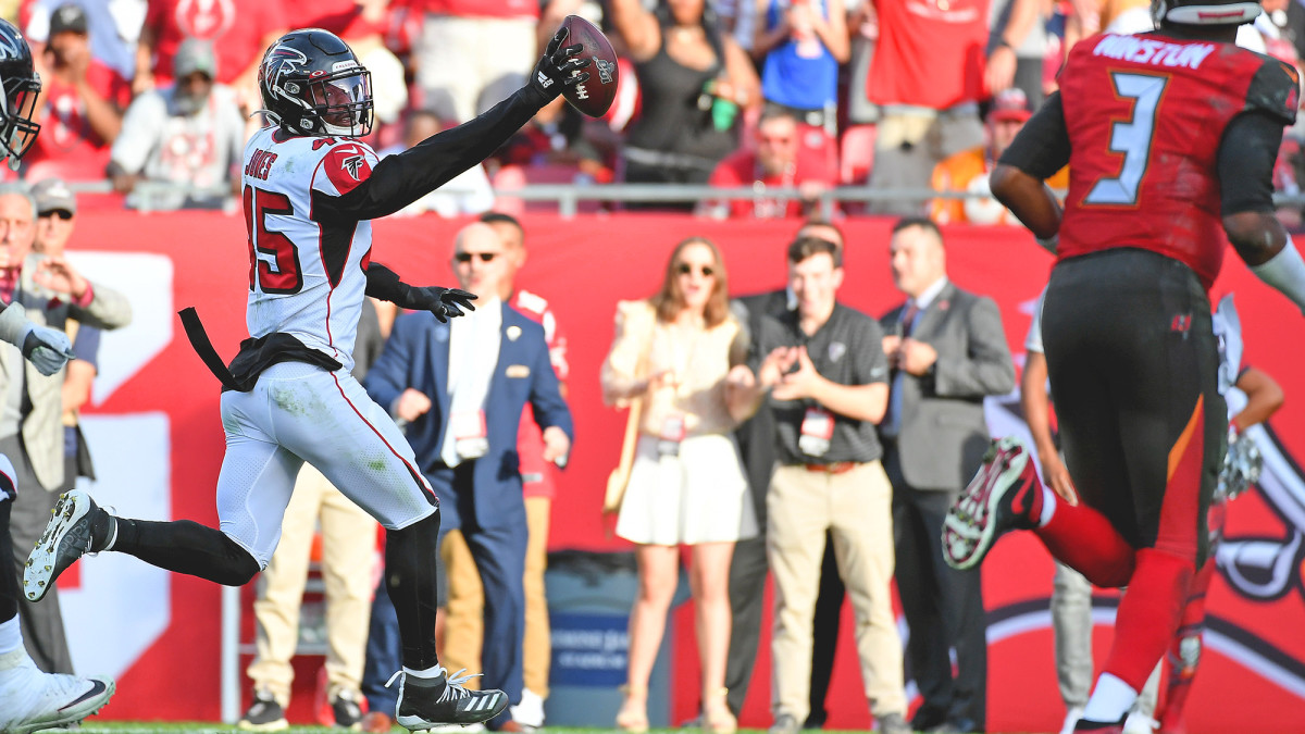 Jones picked off Winston on the first play of overtime and took it 27 yards for a touchdown.