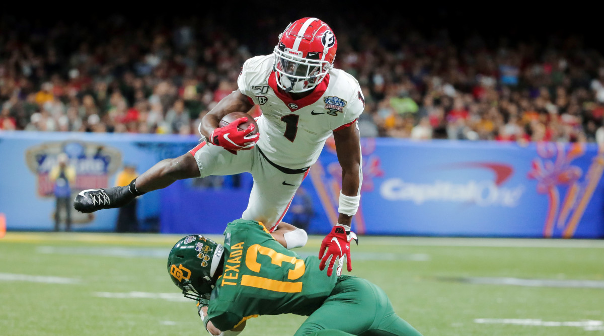 Jan 1, 2020; New Orleans, Louisiana, USA;  Georgia Bulldogs wide receiver George Pickens (1) leaps over Baylor Bears cornerback Raleigh Texada (13) during the second quarter at the Mercedes-Benz Superdome.