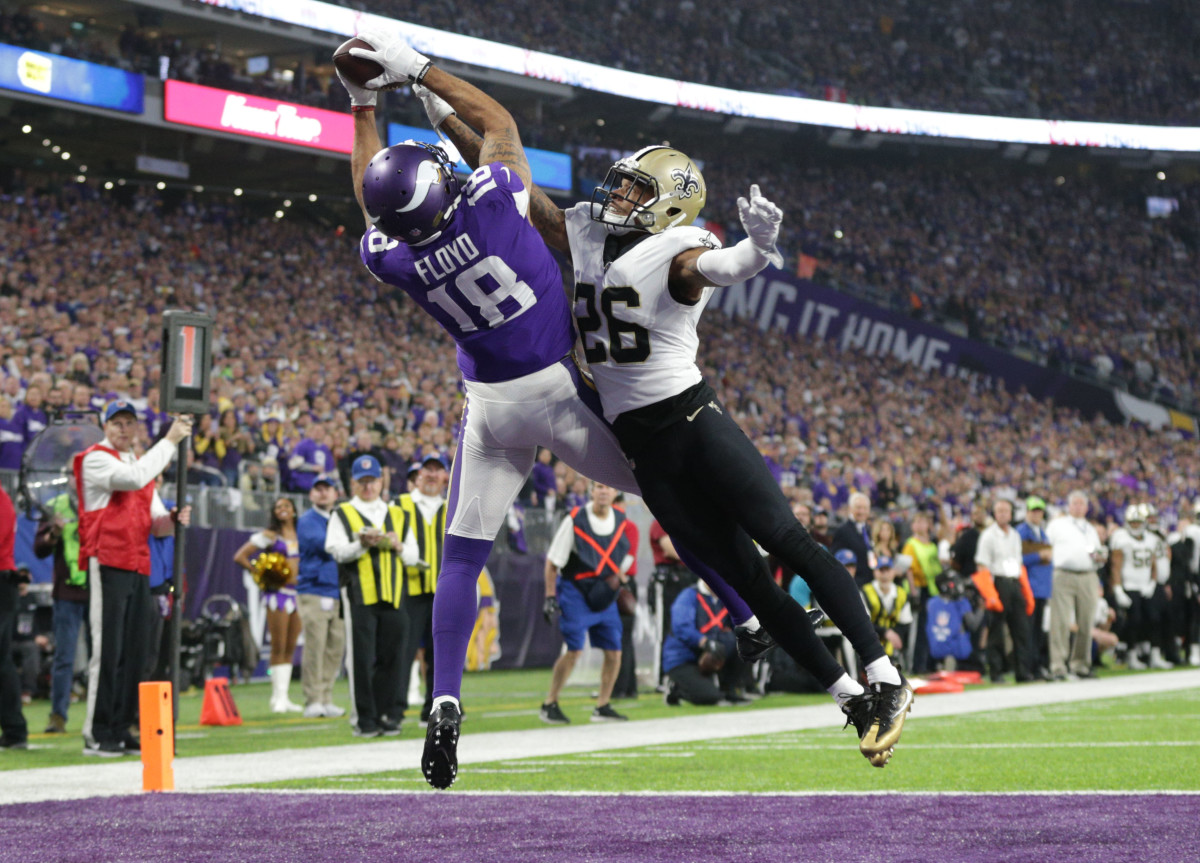 Jan 14, 2018; Minneapolis, MN, USA; Minnesota Vikings wide receiver Michael Floyd (18) cannot catch a pass against New Orleans Saints cornerback P.J. Williams (26) in the first half of the NFC Divisional Playoff football game at U.S. Bank Stadium. Mandatory Credit: Brad Rempel-USA TODAY Sports