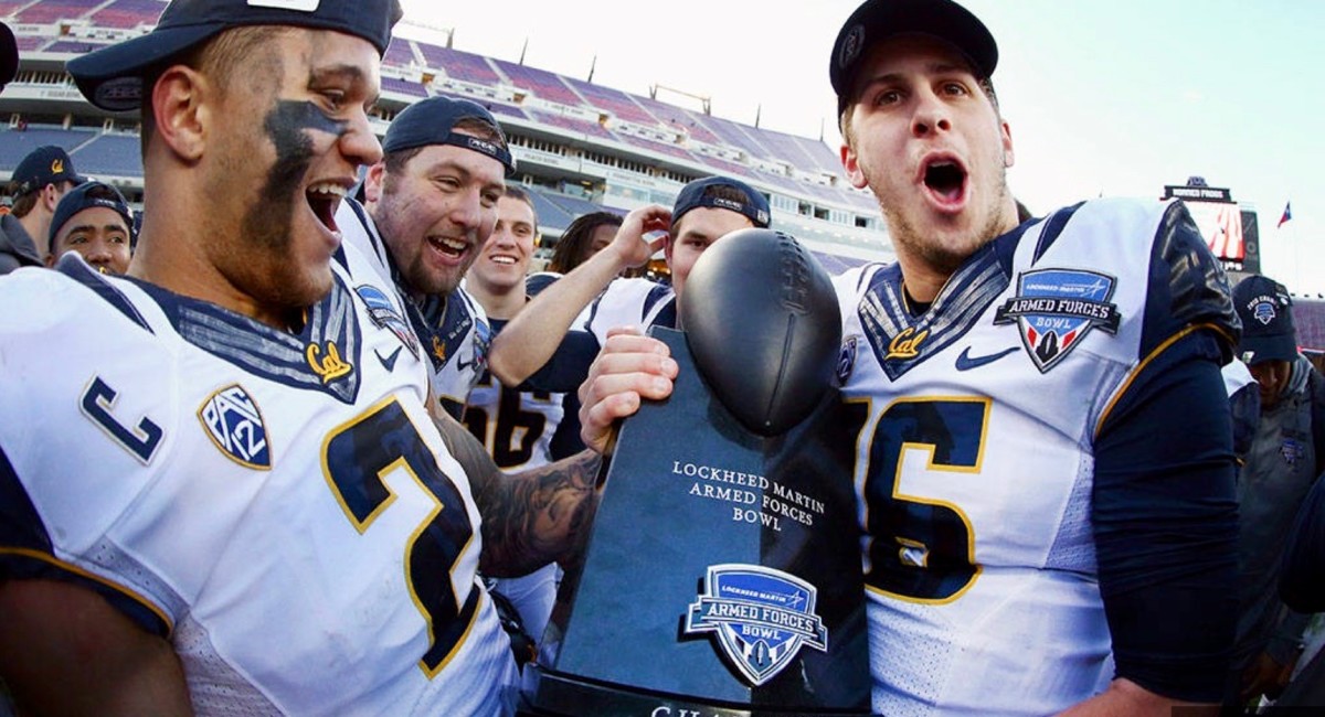 Jared Goff, right, and teammates celebrate the Armed Force Bowl victory.