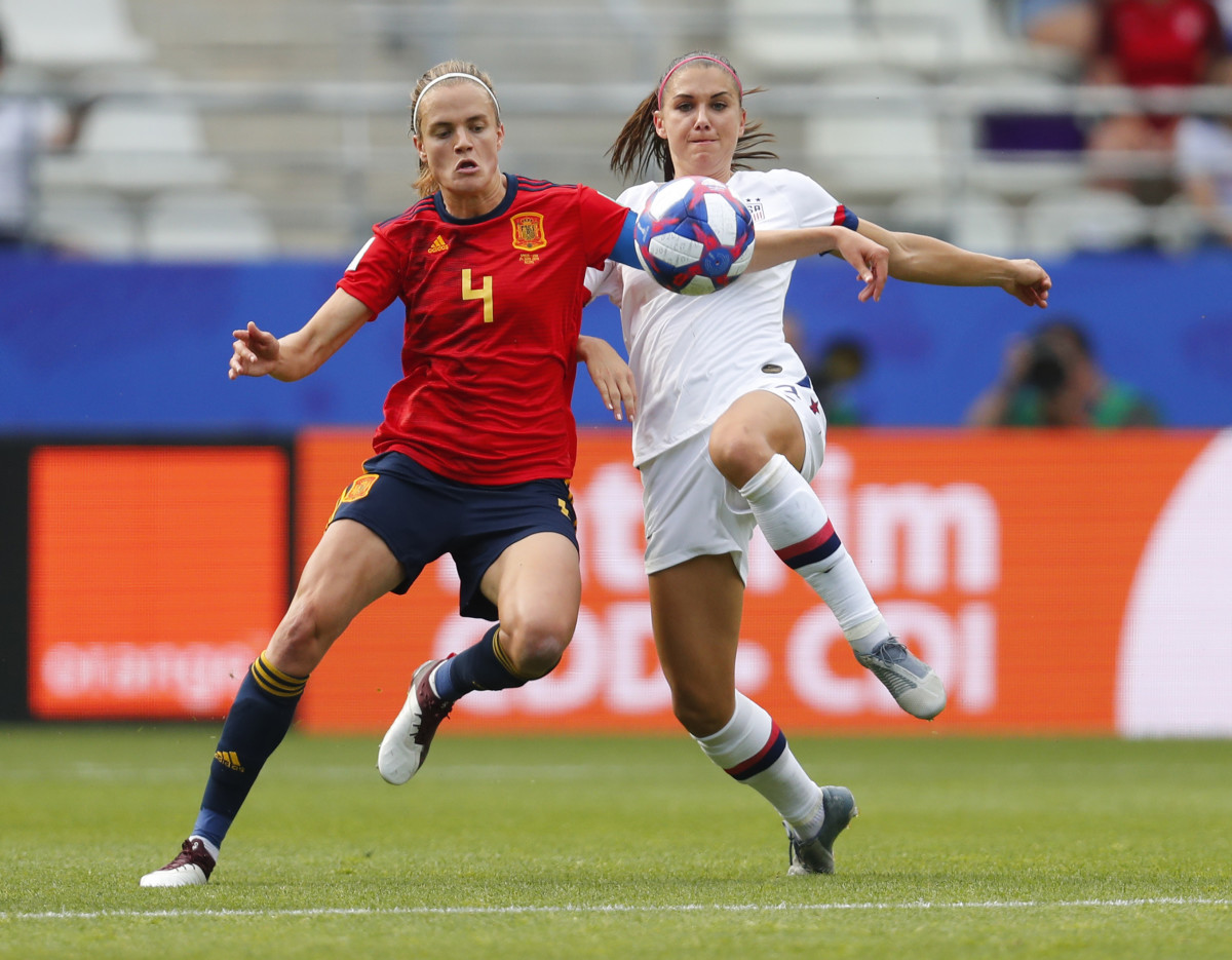 Alex Morgan, right, duels for the ball during the 2019 World Cup.