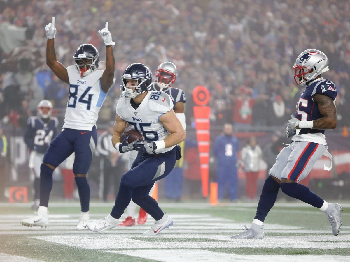 Tennessee Titans tight end Anthony Firkser (86) scores a touchdown against the New England Patriots during the first quarter at Gillette Stadium.