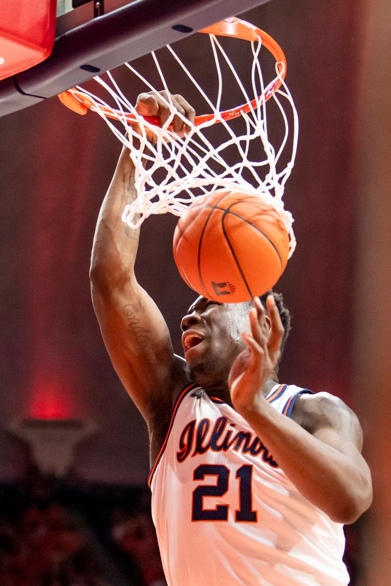 Illinois Fighting Illini center Kofi Cockburn (21) dunks the ball against the Purdue Boilermakers during the first half at State Farm Center.