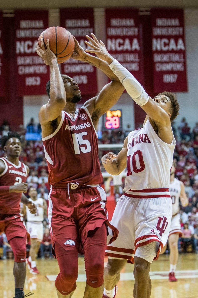 Bloomington, Indiana, USA; Arkansas Razorbacks guard Mason Jones (15) shoots the ball while Indiana Hoosiers guard Rob Phinisee (10) defends in the second half at Simon Skjodt Assembly Hall. Mandatory Credit: Trevor Ruszkowski-USA TODAY Sports