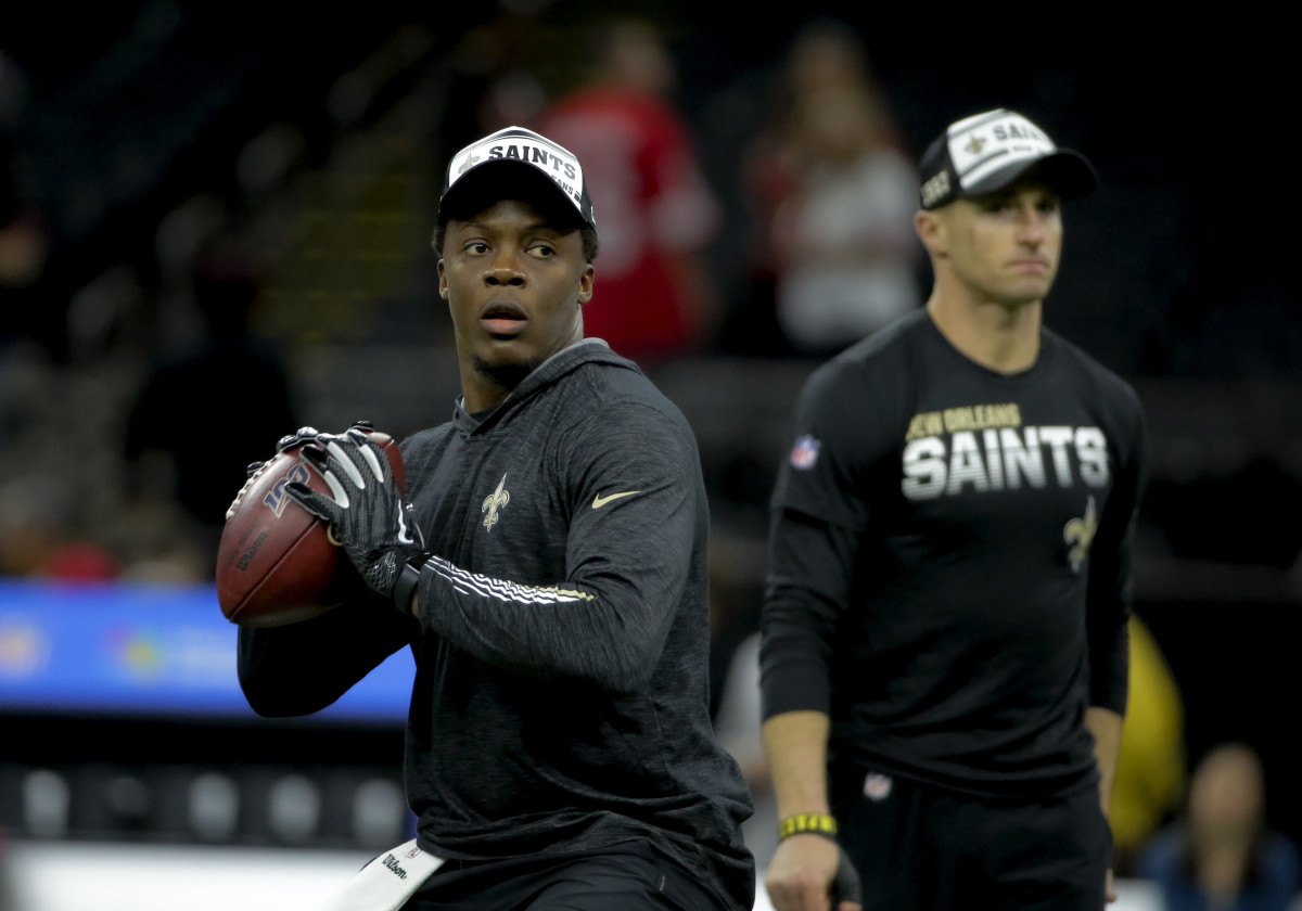 Dec 8, 2019; New Orleans, LA, USA; New Orleans Saints quarterback Teddy Bridgewater throws as quarterback Drew Brees watches during warm ups prior to kickoff against the San Francisco 49ers at Mercedes-Benz Superdome. Mandatory Credit: Derick E. Hingle-USA TODAY Sports