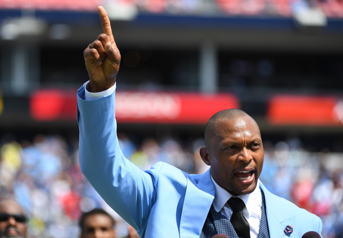 Tennessee Titans former running back Eddie George (27) points to the sky as he talks about former teammate and Titans quarterback Steve McNair during a jersey retirement ceremony at half time of a game against the Indianapolis Colts at Nissan Stadium.