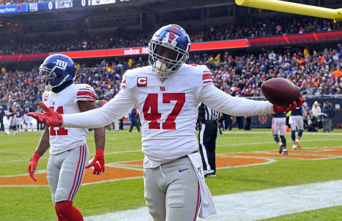 Nov 24, 2019; Chicago, IL, USA; New York Giants outside linebacker Alec Ogletree (47) reacts after making an interception against the Chicago Bears during the first quarter at Soldier Field.