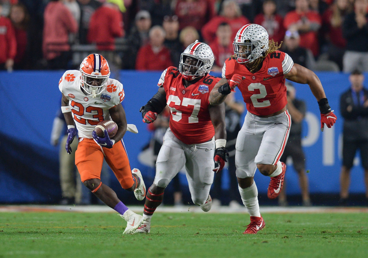 Lyn-J Dixon of Clemson on the run in the CFP semifinal win over Ohio State was recruited heavily by Oklahoma State.
