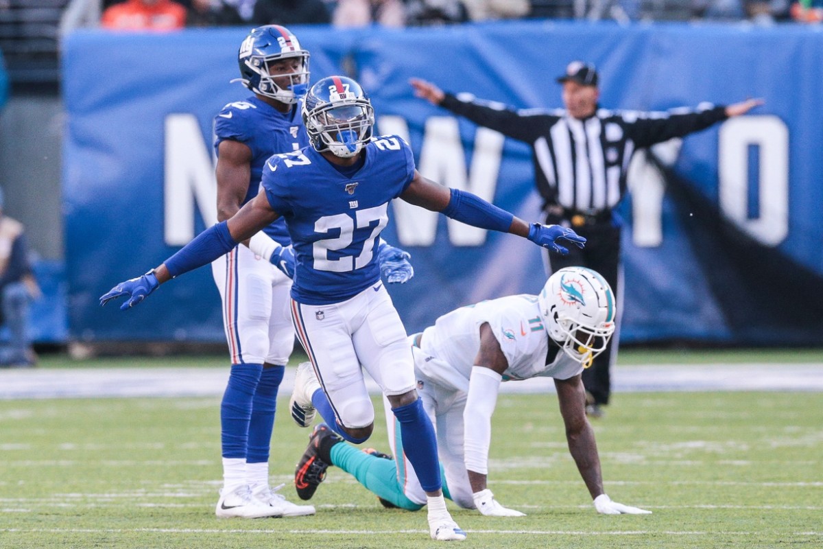 Dec 15, 2019; East Rutherford, NJ, USA; New York Giants cornerback Deandre Baker (27) reacts after breaking up a pass intended for Miami Dolphins wide receiver DeVante Parker (11) during the first half at MetLife Stadium.