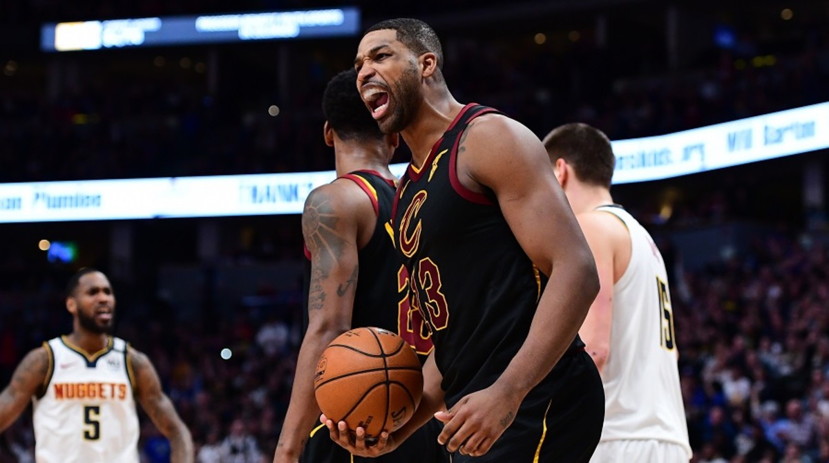 Cavaliers center Tristan Thompson shouts after making a shot against the Nuggets.