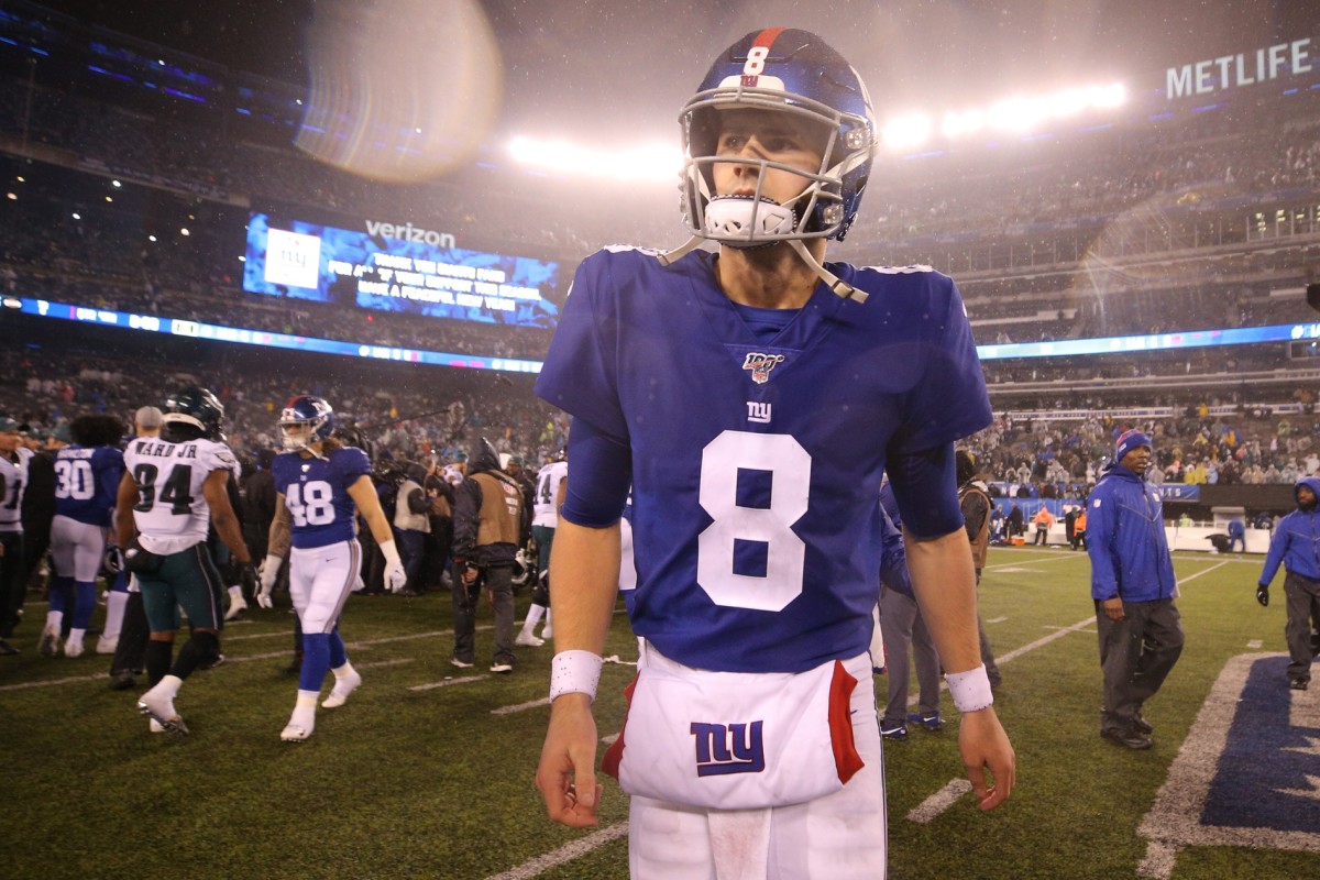 Dec 29, 2019; East Rutherford, New Jersey, USA; New York Giants quarterback Daniel Jones (8) walks off the field after losing to the Philadelphia Eagles at MetLife Stadium.