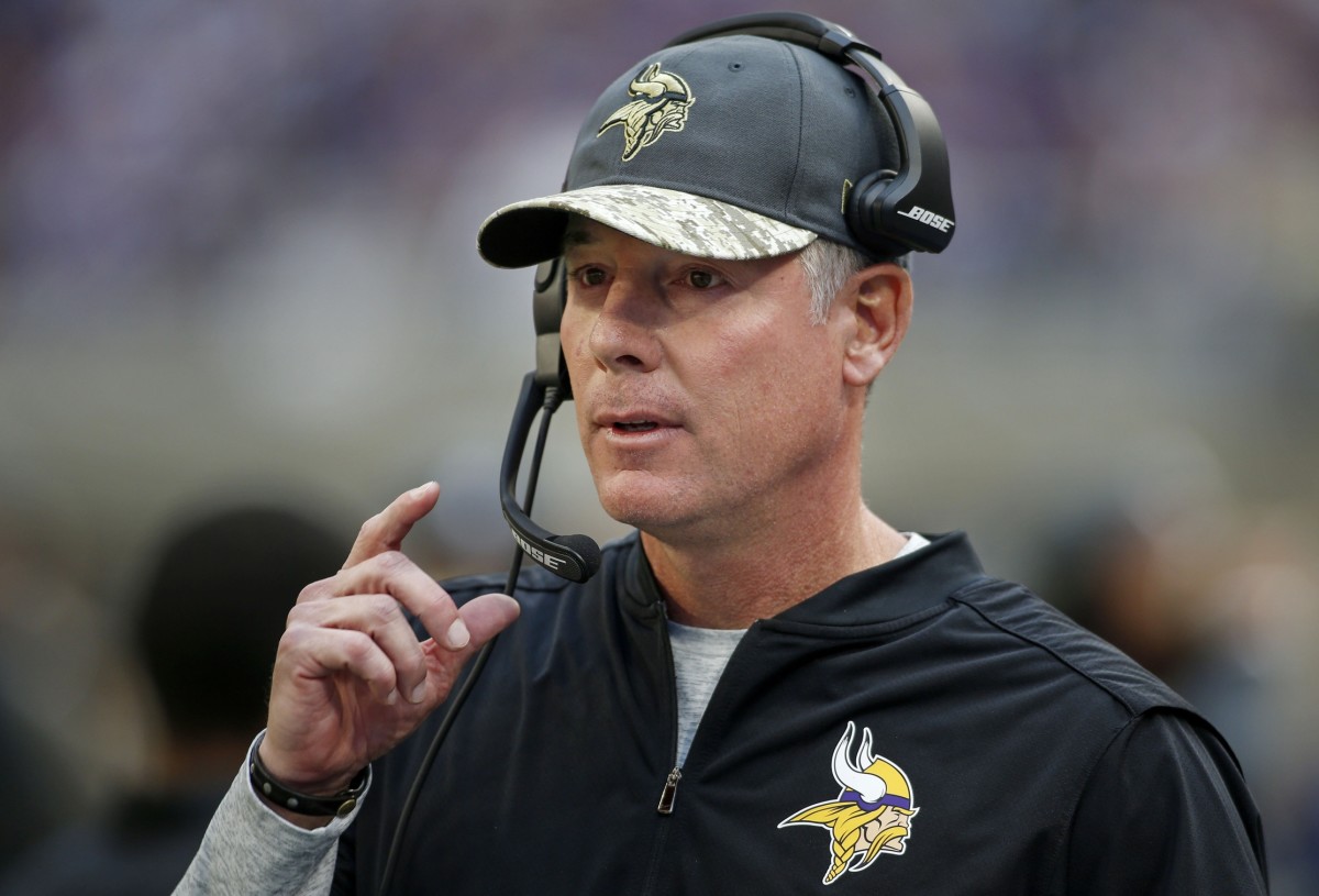 Minnesota Vikings offensive coordinator Pat Shurmur speaks into his head set during the game with the Detroit Lions at U.S. Bank Stadium. The Lions won 22-16 in overtime.