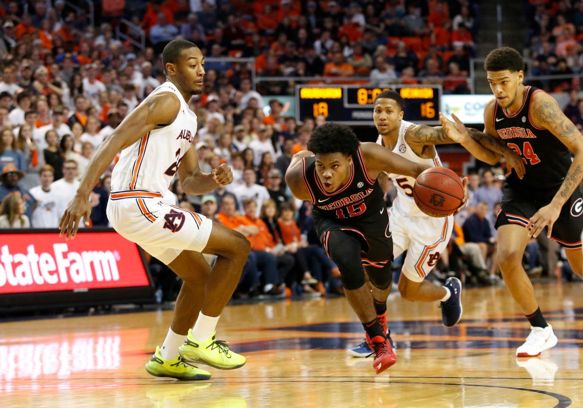 Freshman guard, Sahvir Wheeler drives towards the basket.