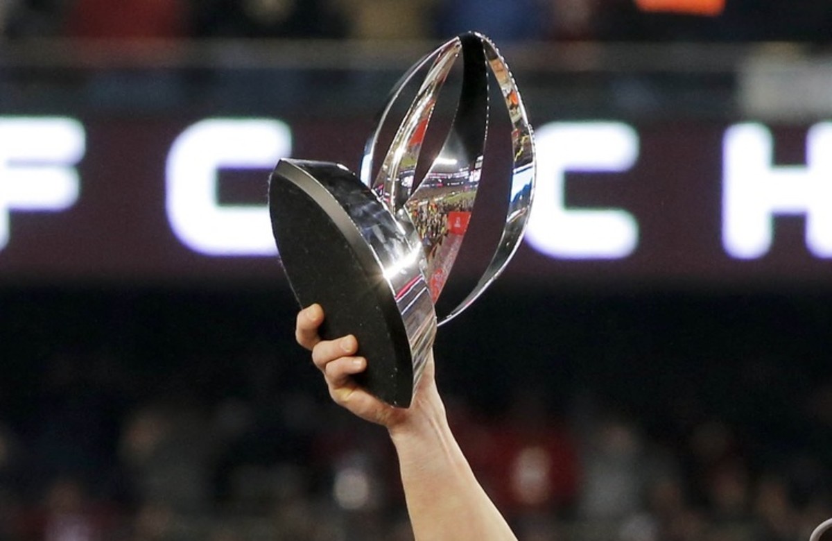 New England Patriots wide receiver Danny Amendola (80) holds up the Lamar Hunt Trophy after the AFC Championship Game against the Jacksonville Jaguars at Gillette Stadium.