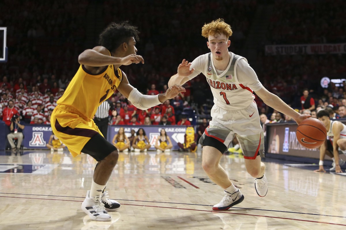 Jan 4, 2020; Tucson, Arizona, USA; Arizona Wildcats guard Nico Mannion (1) dribbles the ball against the Arizona State Sun Devils in the second half at McKale Center. Mandatory Credit: Jacob Snow-USA TODAY Sports