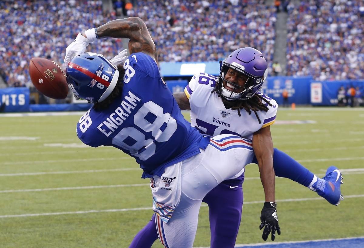 Oct 6, 2019; East Rutherford, NJ, USA; New York Giants tight end Evan Engram (88) cannot catch a pass in the end zone against Minnesota Vikings cornerback Trae Waynes (26) during the second half at MetLife Stadium.