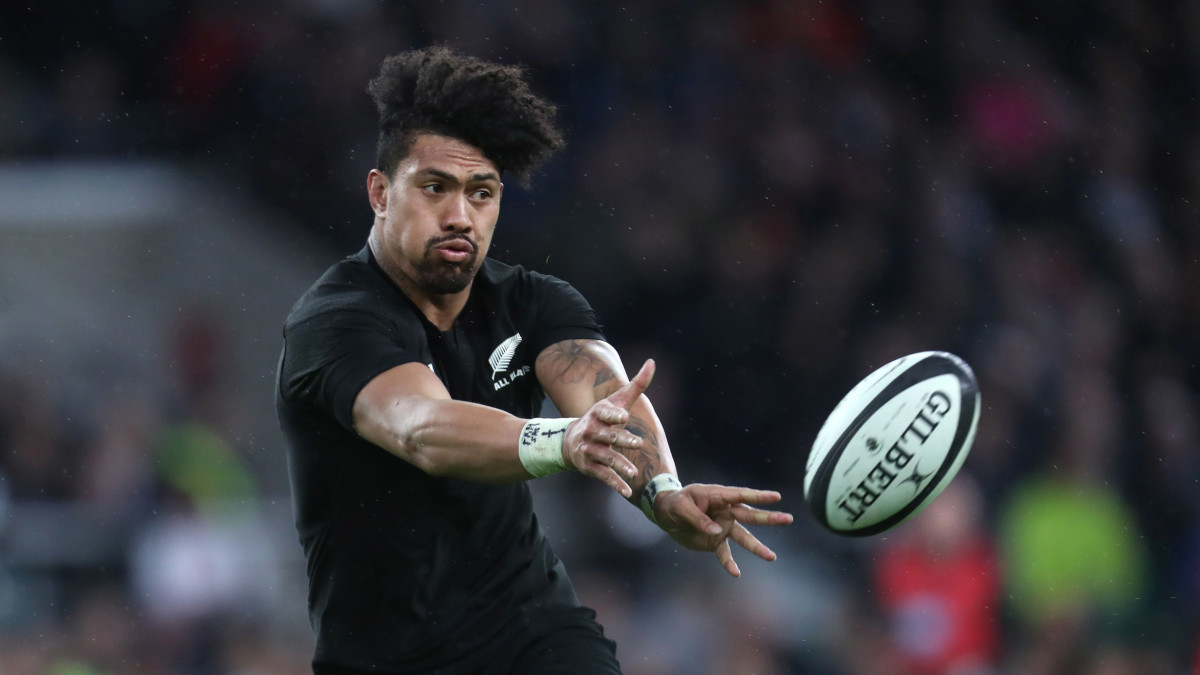 New Zealand All Blacks rugby player Ardie Savea makes a pass during a match