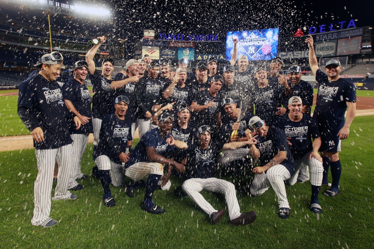 Sep 19, 2019; Bronx, NY, USA; the New York Yankees pose for a photo on the field as they celebrate after winning the American League East after defeating the Los Angeles Angels at Yankee Stadium. Mandatory Credit: Brad Penner-USA TODAY Sports
