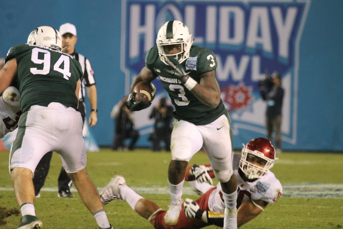 LJ Scott breaks free in the Holiday for the Spartans. (Photo: Duffy Carpenter, Spartan Nation @DuffyCarpenter1)