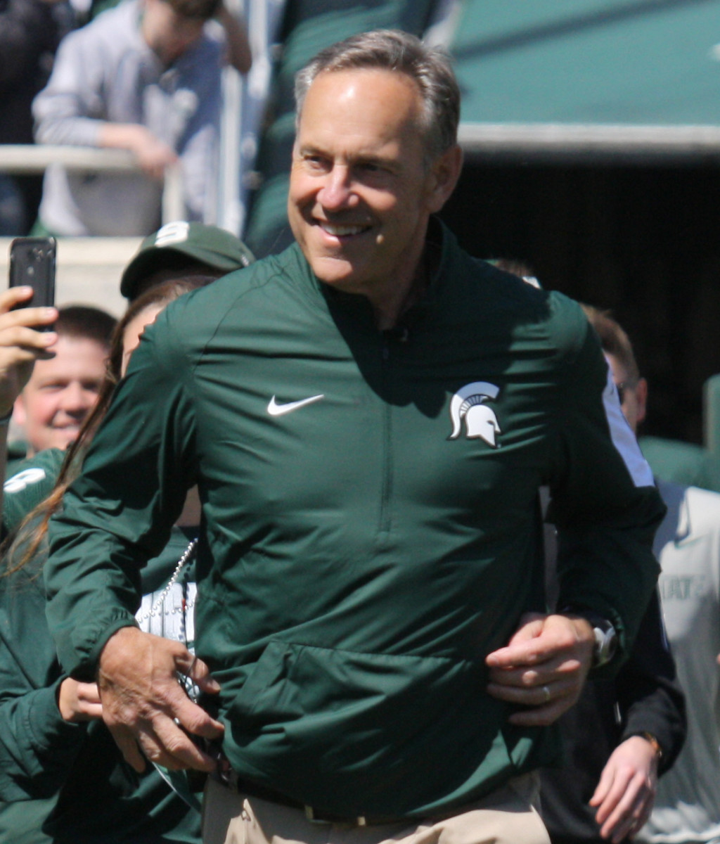 Mark Dantonio running out for the 2016 spring football game.  Photo courtesy of Mark Boomgaard.