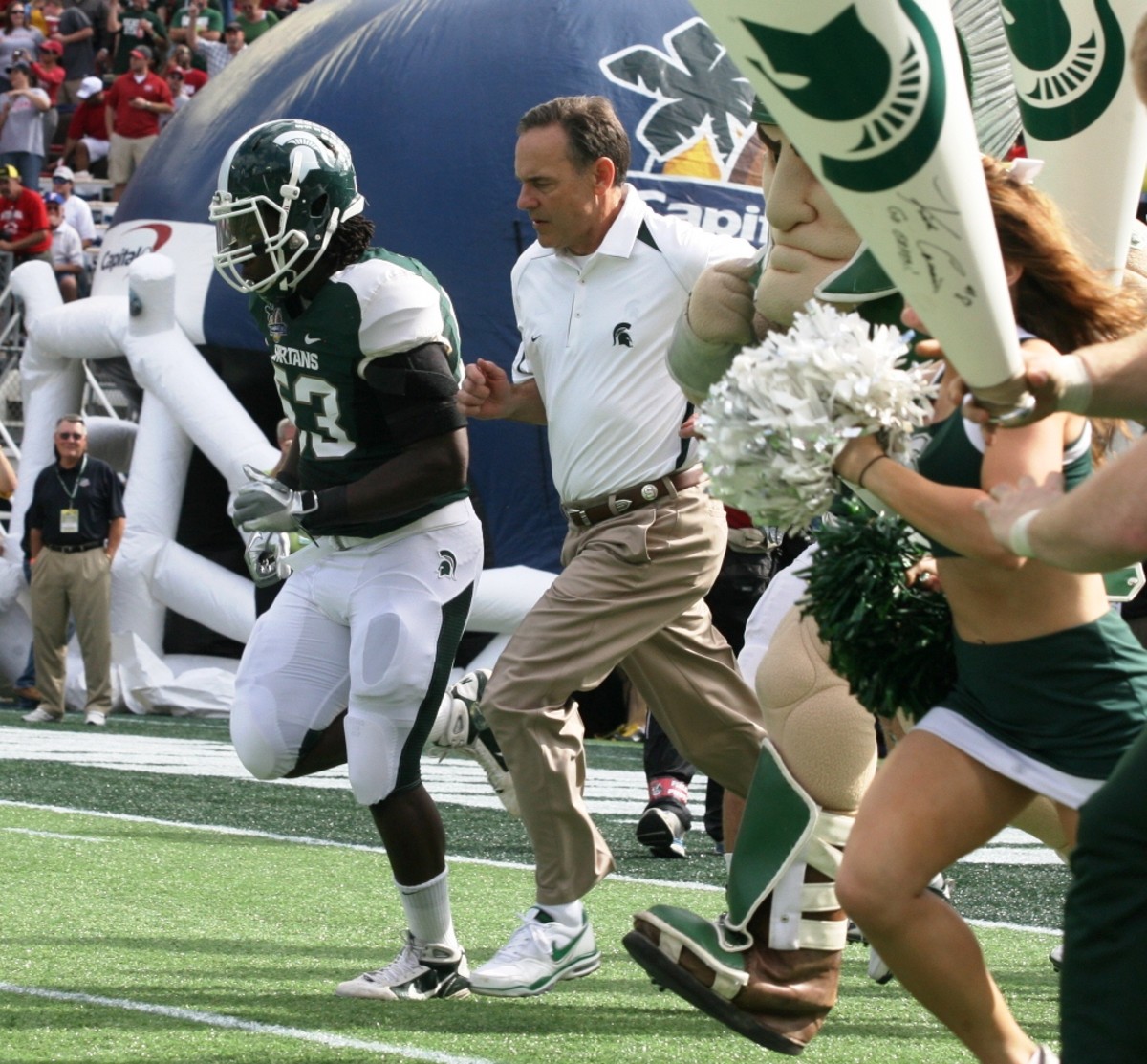 Coach Dantonio and the Spartans are marching forward this off season.  Photo courtesy of Bill Marklevits.