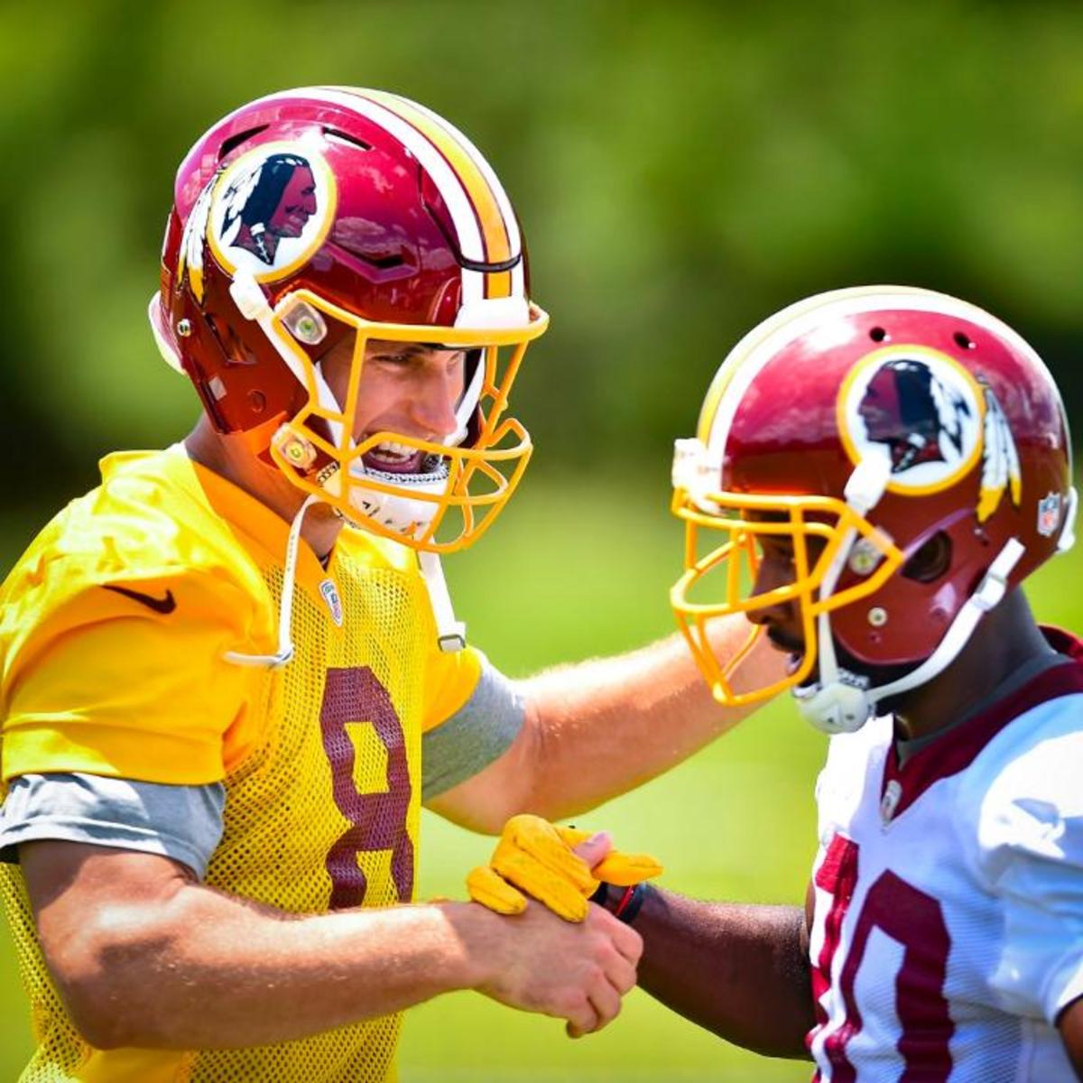 Kirk Cousins working hard during the 2016 Redskins offseason OTA's.  Photo courtesy of the Redskins.