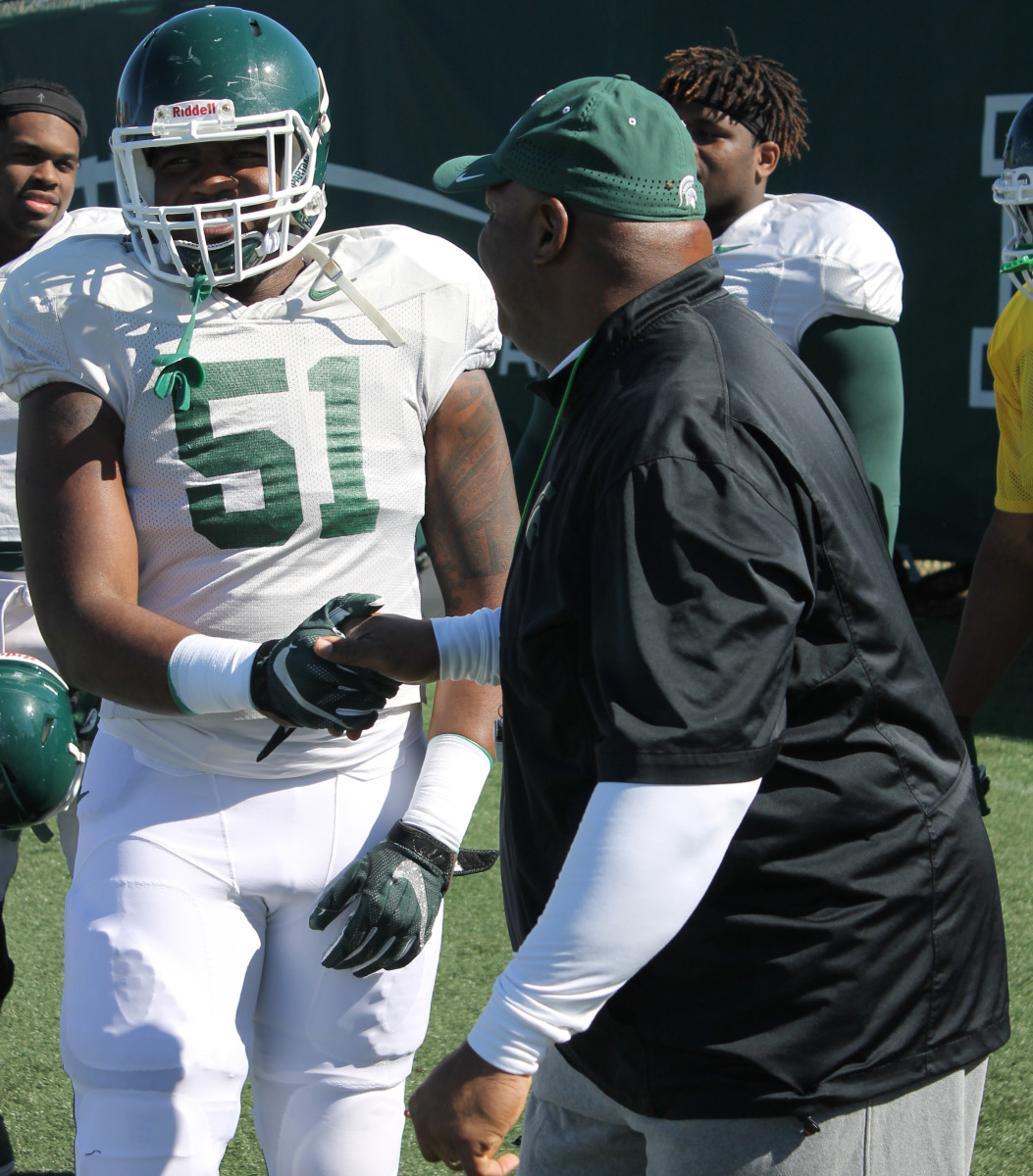 Kyonta Stallworth learning a new position from Coach Ron Burton spring 2016.