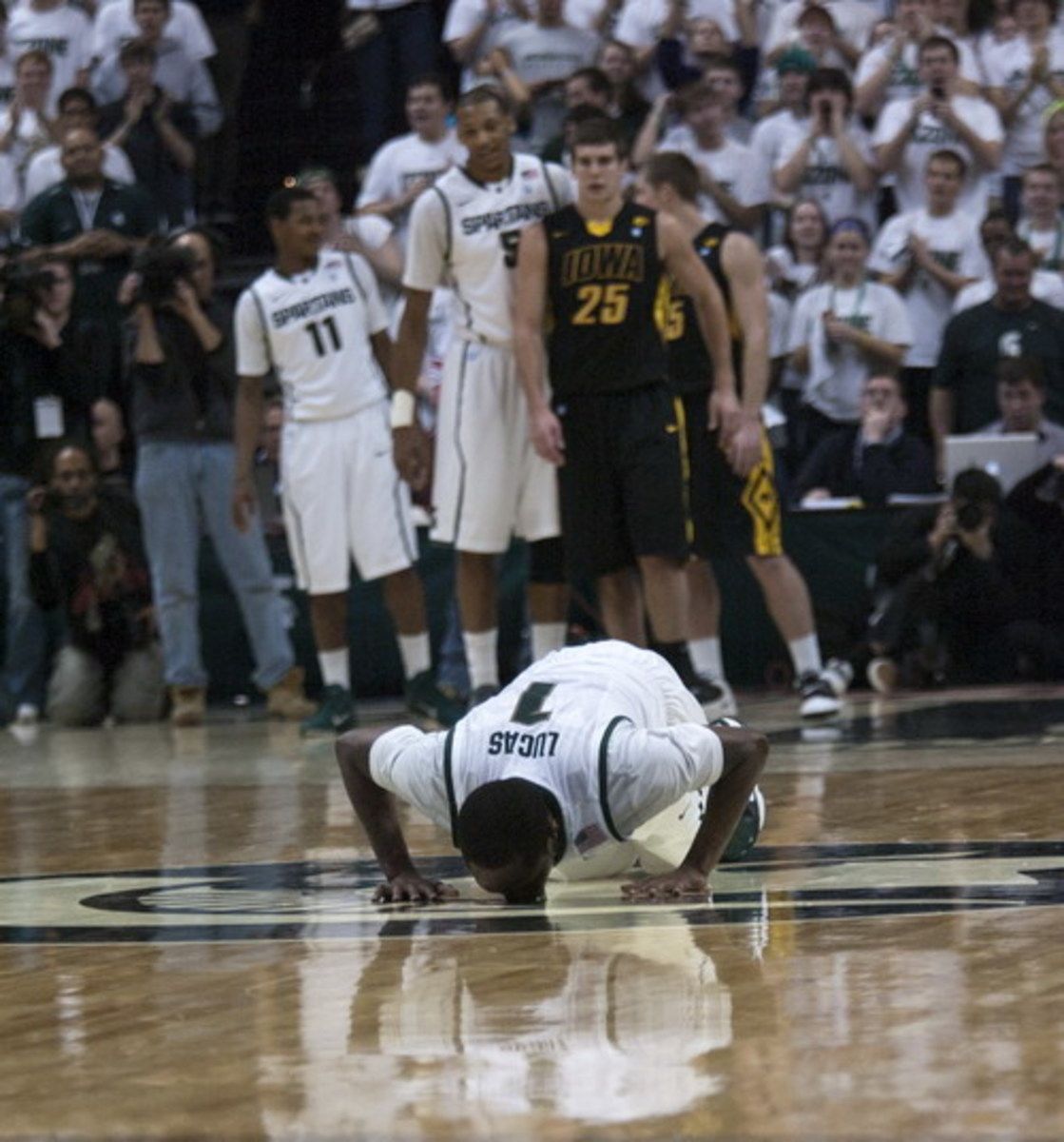 Surely Lucas deserves his jersey in the rafters at the Breslin. Lucas is seen in the above picture kissing the Spartan at center court on his senior day. Photo courtesy of Starr Portice.