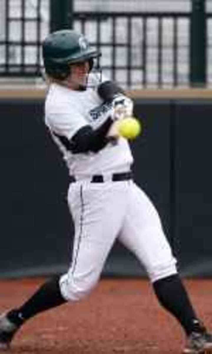 Sarah Bowling blasts game winning homer in game two.  Photo courtesy of MSU SID.